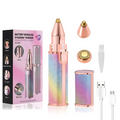 Battery operated eyebrow trimmer with rainbow design, packaging, and accessories on a white background
