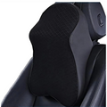 Black car seat cushion with quilted design on a white background