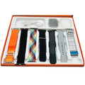 Collection of watch bands and accessories in a box on a white background