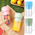 Colorful infuser cups with fruits on a grassy background