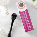 Derma roller system with black roller and pink packaging on a white background