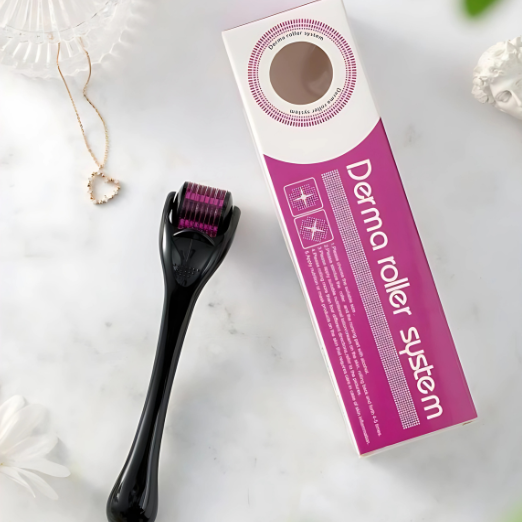 Derma roller system with black roller and pink packaging on a white background