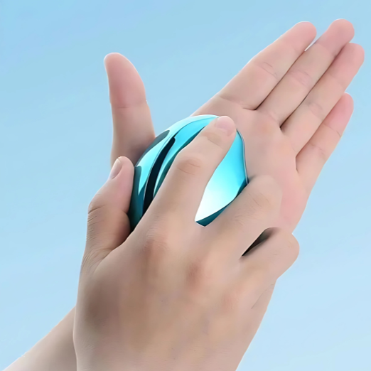 Hand holding a blue stress ball against 