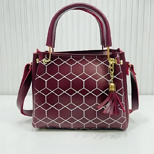 Maroon handbag with geometric pattern and gold accents