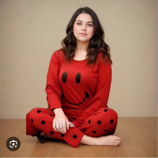 Person wearing a red outfit with a smiley face design on a beige background