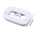 White electronic device with dimensions labeled