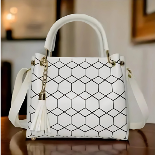 Black handbag with geometric pattern on a wooden surface