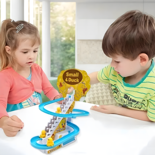 Child playing with a toy duck track set against a white background