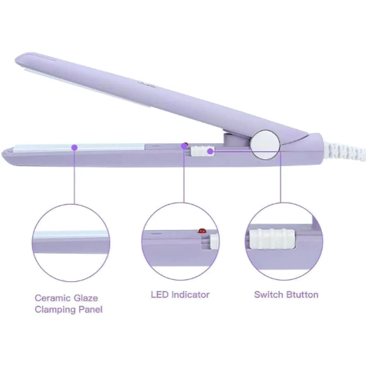 Set of colorful hair straighteners on a white surface with a magazine and plant in the background.